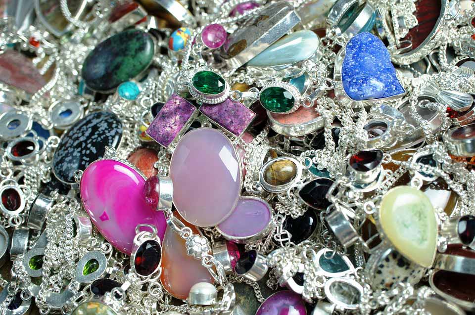 A lot of cheap jewelry mixed over the counter. This is one more common travel scam you need to what out for. 