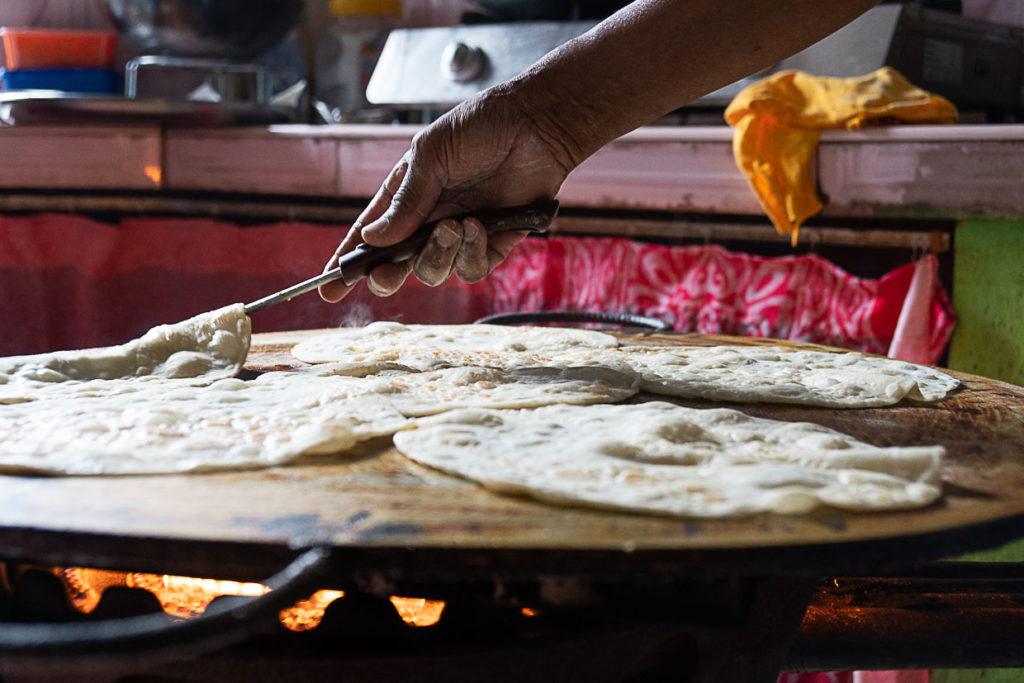 Mauritius traditional food, this is a chapati being cooked. 