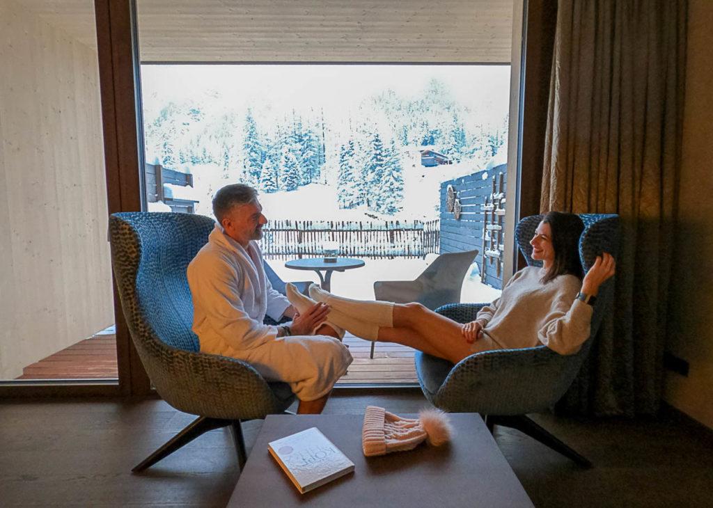 Couple relaxing in a hotel room in Europe during winter.