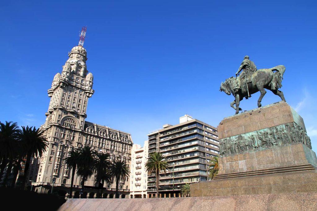 The Plaza Independencia in Montevideo, Uruguay. The Palacio Salvo in the Background and the Monument of the grave of General Artigas in the Foreground.