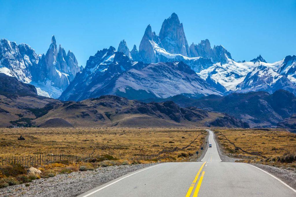 Fine concrete highway to the majestic Mount Fitz Roy. Sunny autumn day in February. Argentine Patagonia