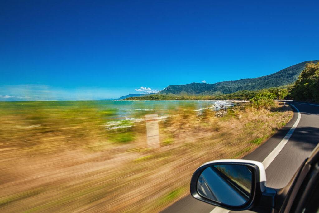 Road trip in Australia with motion blur along Ellis Beach near Palm Cove and Cairns, Queensland.