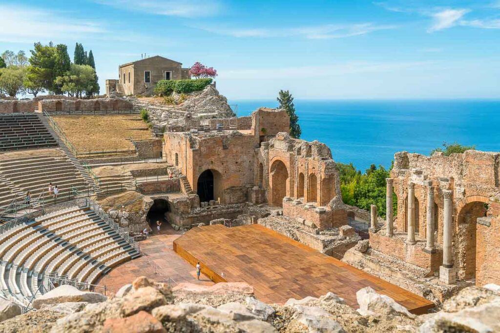Photo of a Greek amphitheater in Taormina, one of the must visit places in Sicily, Italy.