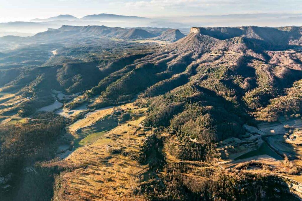 Aerial photo of La Garrotxa Natural Park in Catalonia. One of the destinations you can visit on a day trip from Girona.