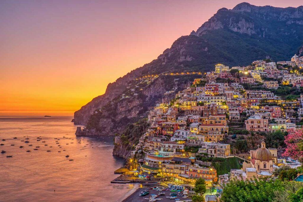 The city of Sorrento with the sunset golden light and a view of the sea on the Amalfi Coast.
