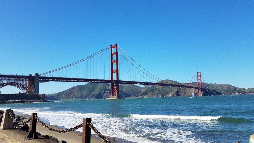 Photo of San Francisco Bay with Golden Gate Bridge in the center. San Francisco is a perfect destination for a romantic weekend in Northern California