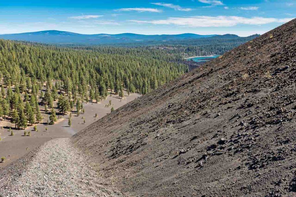 At the top of Cinder Cone, Lassen National Park looking back down the trial and across the forest. A must-visit place in Northern California.