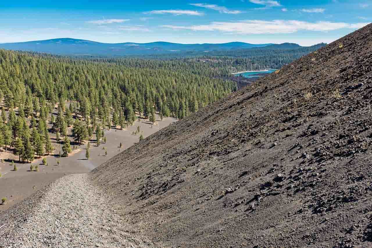 At the top of Cinder Cone, Lassen National Park looking back down the trial and across the forest. A must-visit place in Northern California.