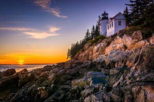 Bass Harbor Lighthouse at sunset, in Acadia National Park, Maine. This is the northmost east coast national park in the USA.