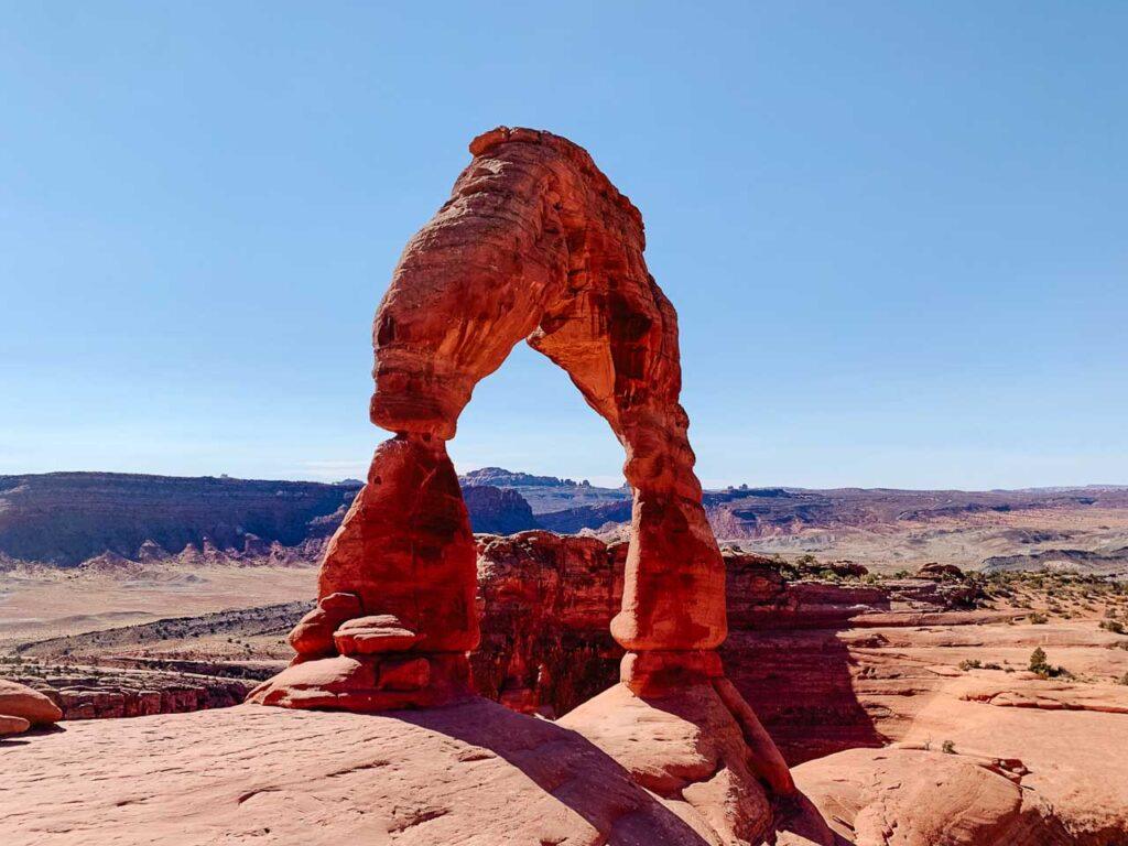 The Delicate Arch is a red rock formation and the most famous landmark at Arches National Park.