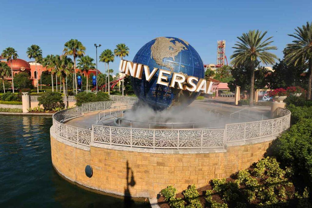 ORLANDO, FLORIDA. Universal Studios theme park entrance with globe and sign.