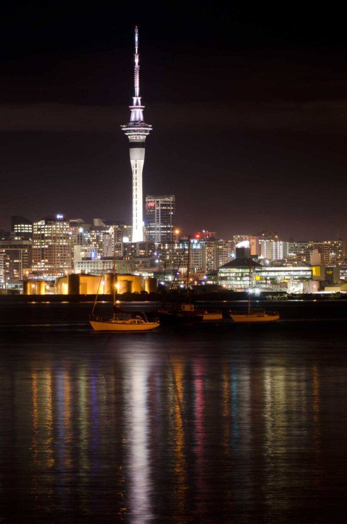Auckland Sky Tower at night. The Sky Tower is the tallest man-made structure in New Zealand and visiting it is the perfect thing to do in Auckland as a couple.