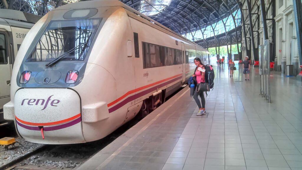Nat traveling from Barcelona to Valencia, Spain, by high-speed train.