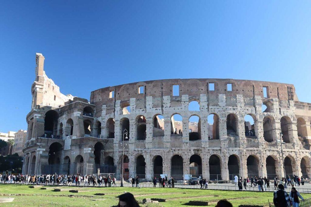 Photo of the Colosseum facade, one of the most famous attractions in Rome, Italy.